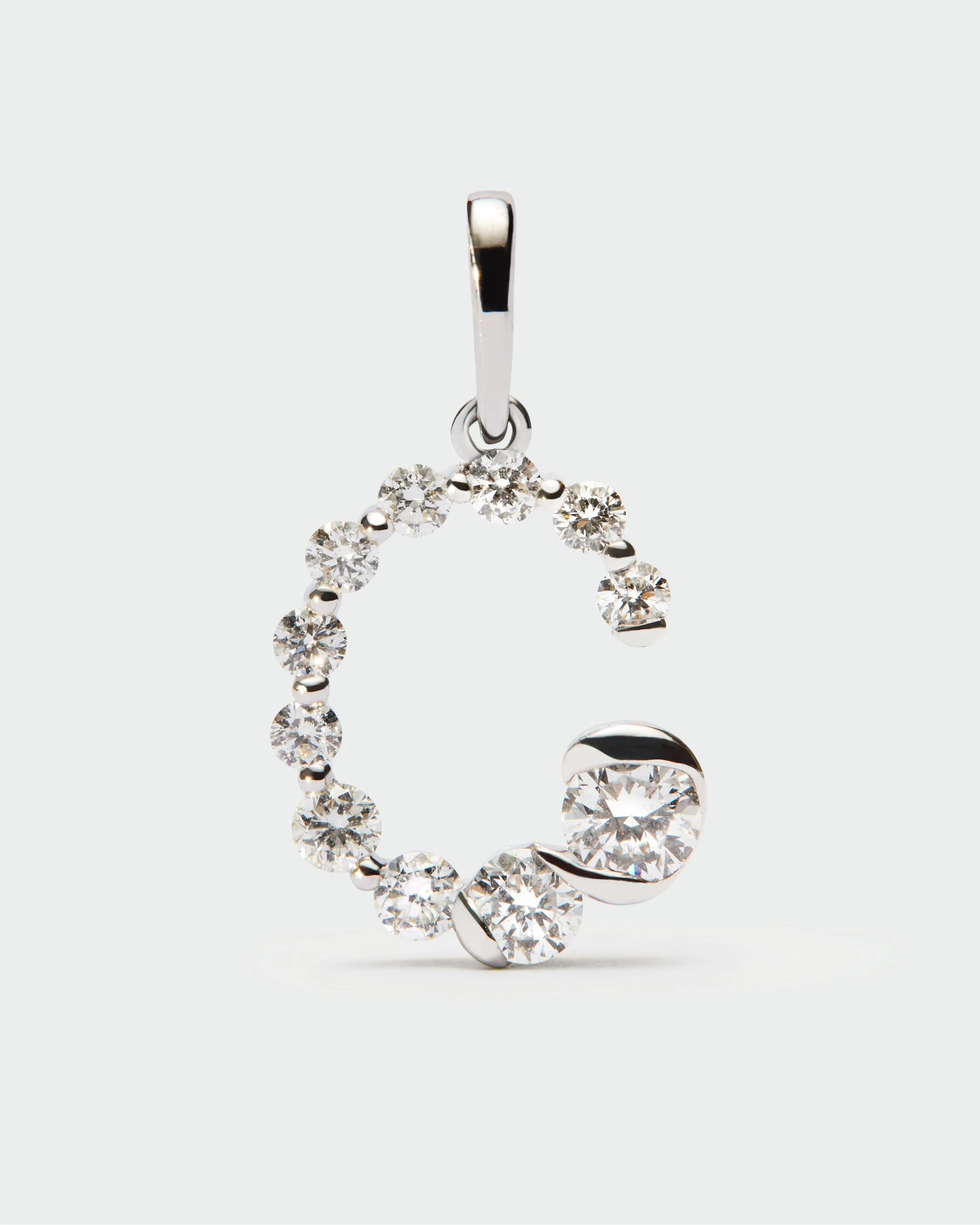 Diamonds and white gold C initial pendant