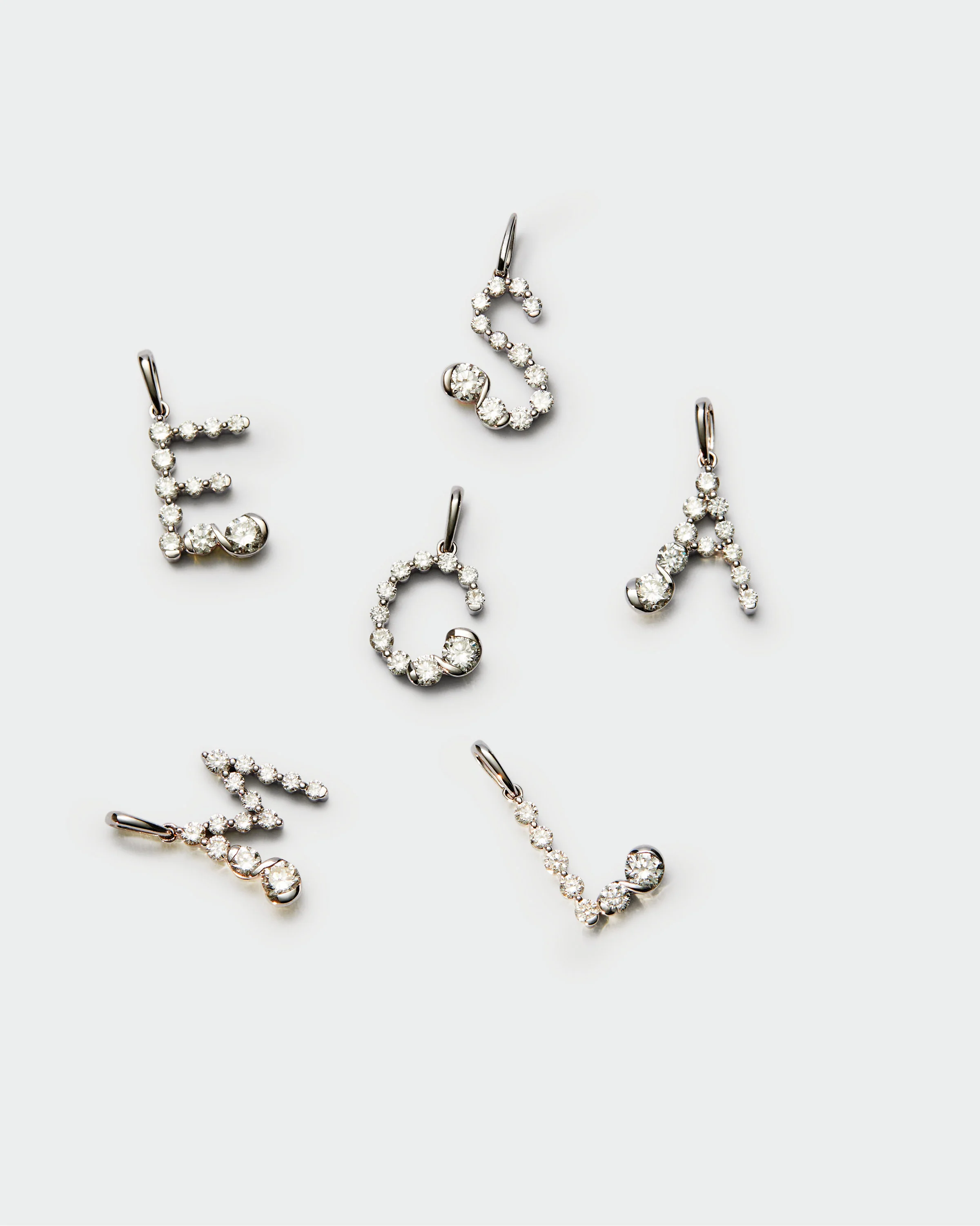Diamonds and white gold C initial pendant 8 Diamonds and white gold C initial pendant