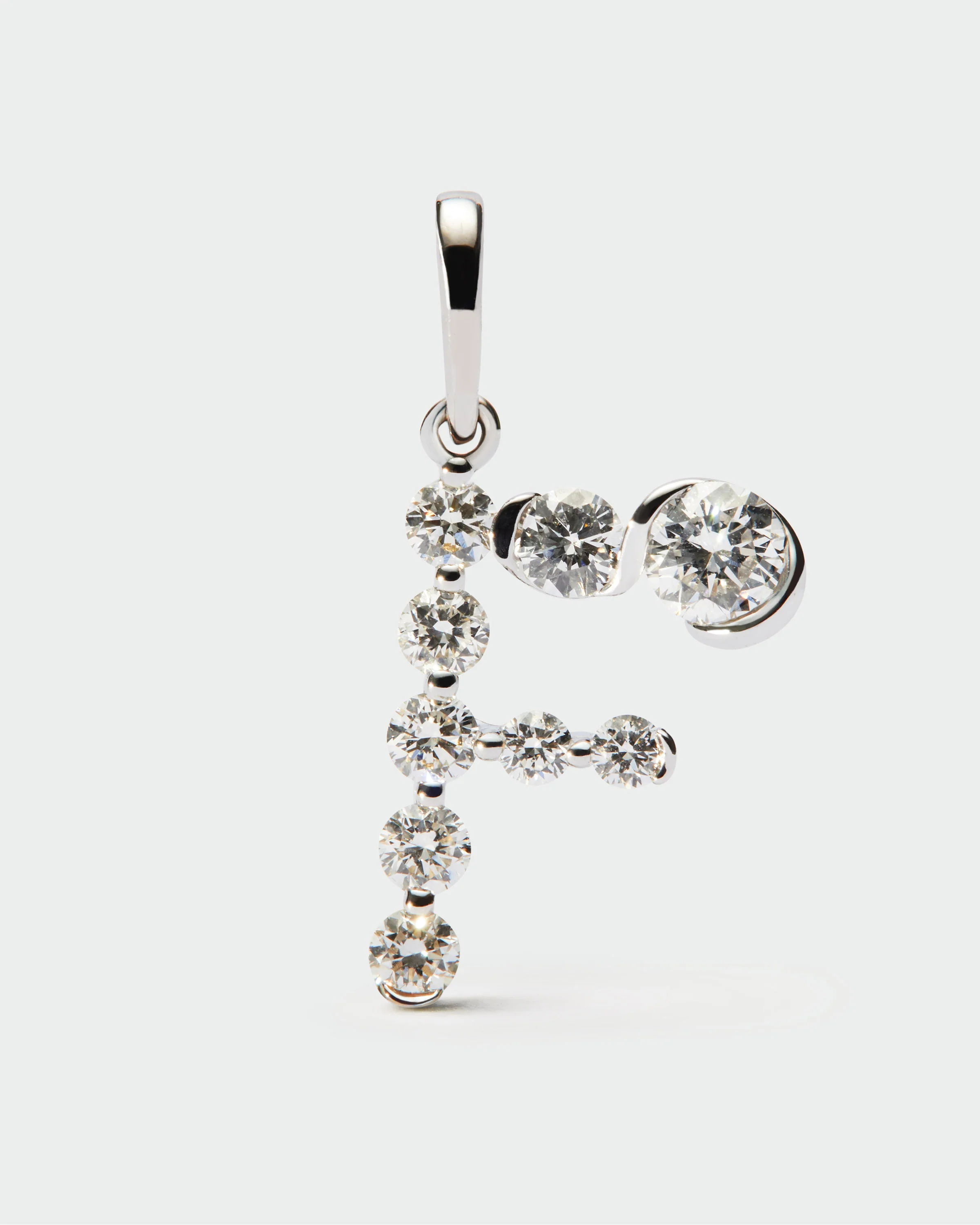 Diamonds and white gold F initial pendant