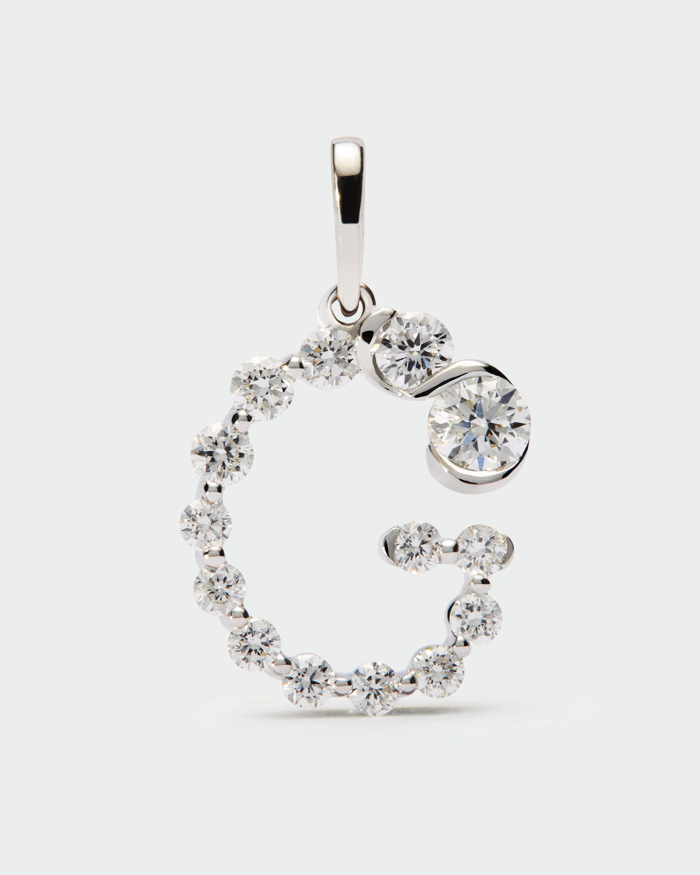 Diamonds and white gold G initial pendant