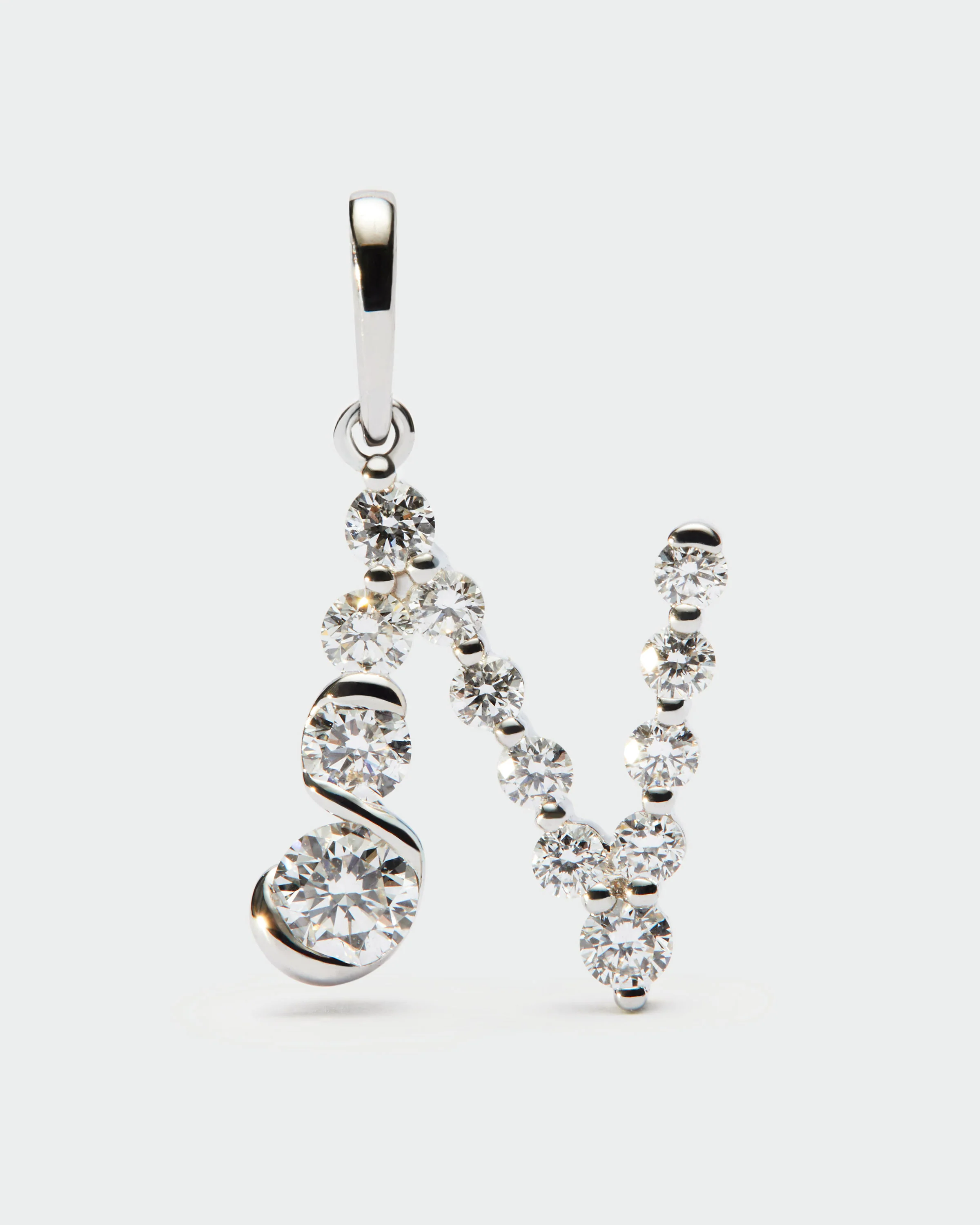Diamonds and white gold N initial pendant