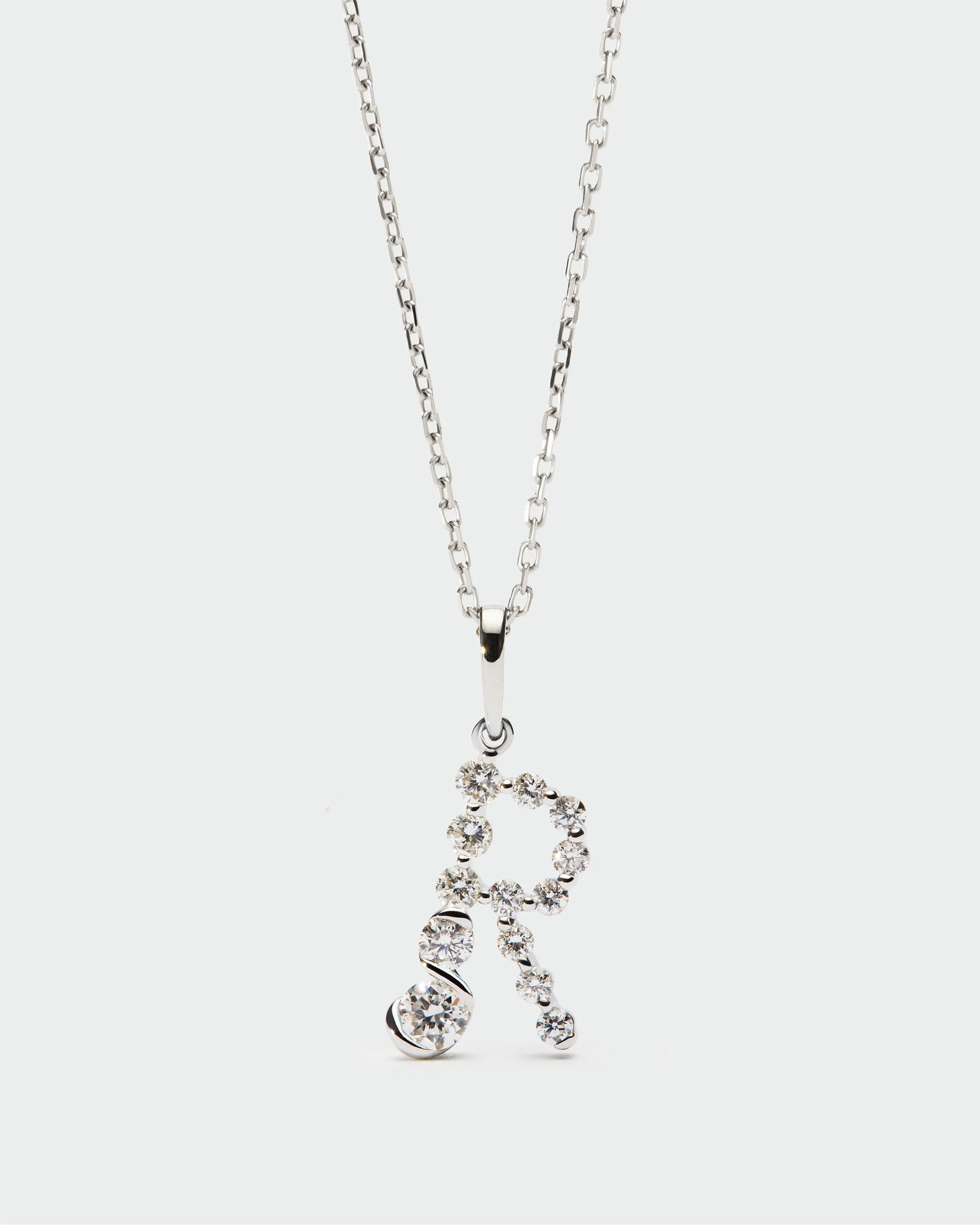 Diamonds and white gold R initial pendant 3 Diamonds and white gold R initial pendant