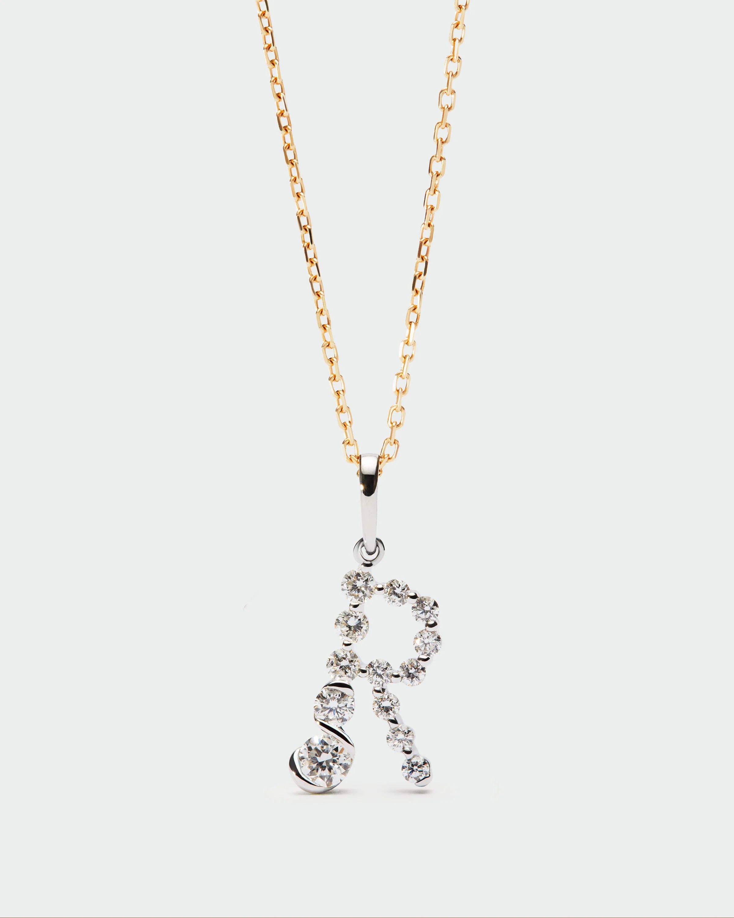 Diamonds and white gold R initial pendant 5 Diamonds and white gold R initial pendant