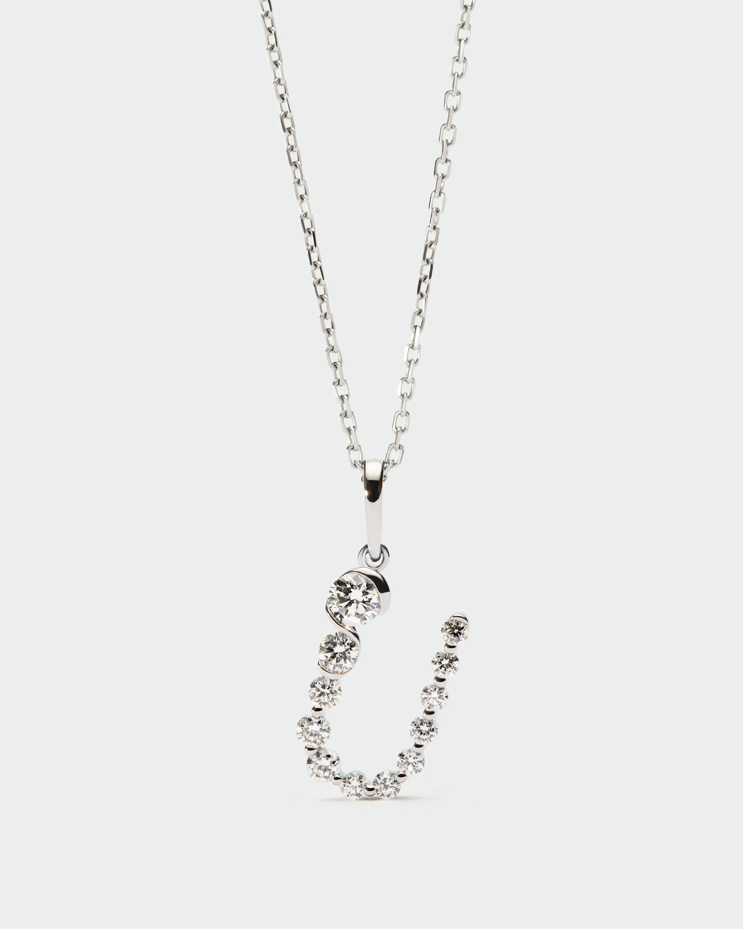 Diamonds and white gold U initial pendant 3 Diamonds and white gold U initial pendant