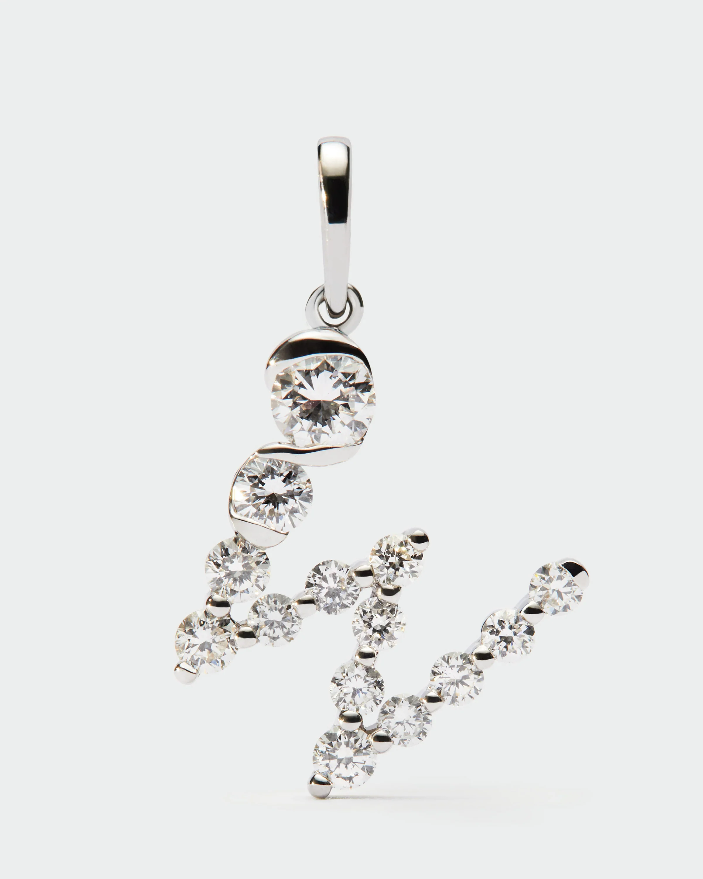 Diamonds and white gold W initial pendant
