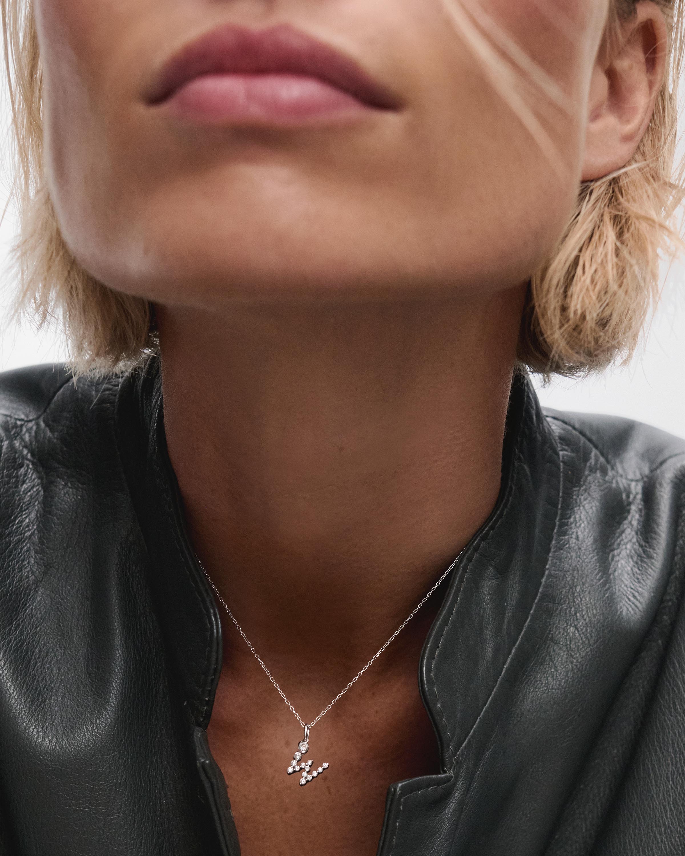 Diamonds and white gold W initial pendant 4 Diamonds and white gold W initial pendant