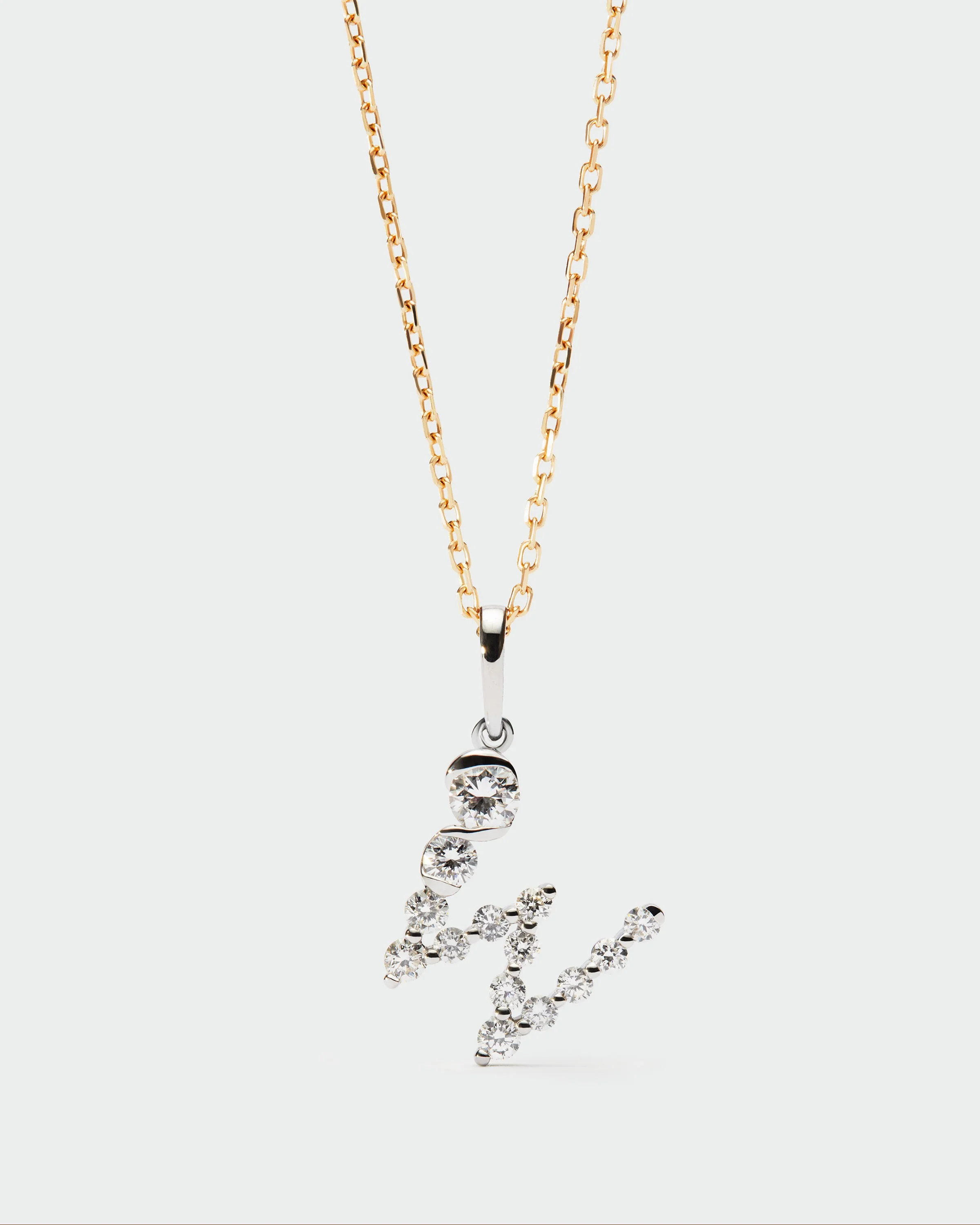 Diamonds and white gold W initial pendant 5 Diamonds and white gold W initial pendant